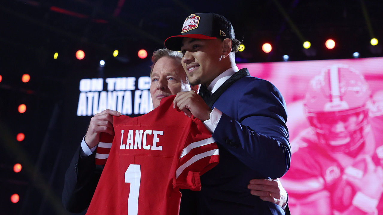 CLEVELAND, OHIO - APRIL 29: Trey Lance poses with NFL Commissioner Roger Goodell onstage after being selected third by the San Francisco 49ers during round one of the 2021 NFL Draft at the Great Lakes Science Center on April 29, 2021 in Cleveland, Ohio.