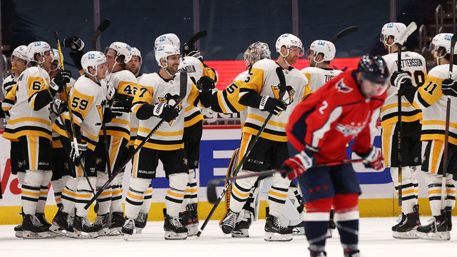 WASHINGTON, DC - APRIL 29: The Pittsburgh Penguins celebrate after defeating the Washington Capitals in overtime at Capital One Arena on April 29, 2021 in Washington, DC.