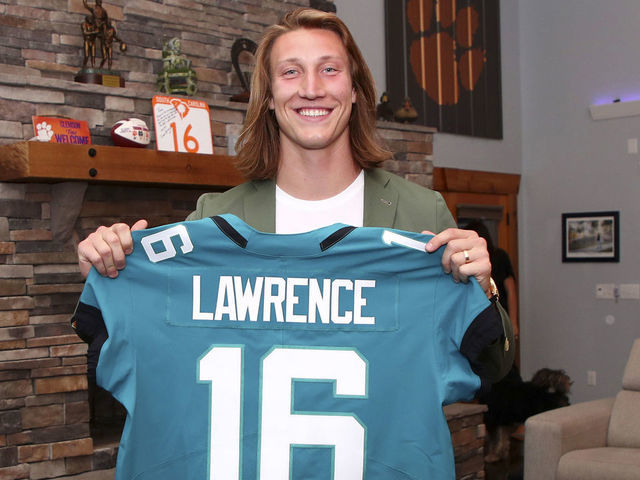 SENECA, SOUTH CAROLINA - APRIL 29: In this handout photo provided by the National Football League, quarterback Trevor Lawrence poses after being selected with the first overall pick by the Jacksonville Jaguars in the 2021 NFL Draft on April 29, 2021 in Seneca, South Carolina.