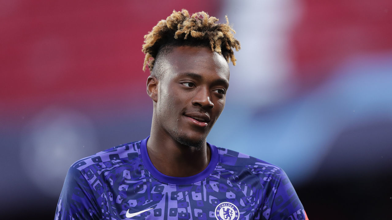 SEVILLE, SPAIN - APRIL 13: Tammy Abraham of Chelsea warms up before the UEFA Champions League Quarter Final Second Leg match between Chelsea FC and FC Porto at Estadio Ramon Sanchez Pizjuan on April 13, 2021 in Seville, Spain. Sporting stadiums around Spain remain under strict restrictions due to the Coronavirus Pandemic as Government social distancing laws prohibit fans inside venues resulting in games being played behind closed doors.