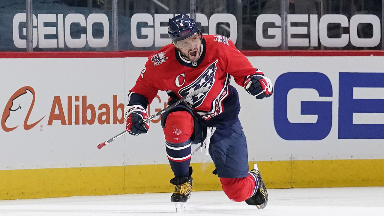 WASHINGTON, DC - MARCH 16: Alex Ovechkin #8 of the Washington Capitals celebrates after scoring his 718th career NHL goal in the second period against the New York Islanders at Capital One Arena on March 16, 2021 in Washington, DC. Ovechkin passed Phil Esposito for sixth all time on the NHL goal scoring list with the goal.