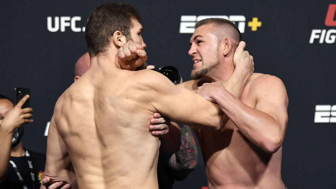 LAS VEGAS, NEVADA - APRIL 30: (L-R) Opponents Ion Cutelaba of Moldova and Dustin Jacoby face off during the UFC weigh-in at UFC APEX on April 30, 2021 in Las Vegas, Nevada.