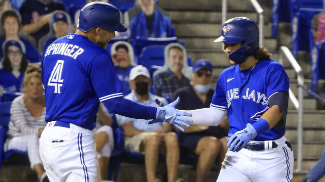 DUNEDIN, FLORIDA - APRIL 30: Bo Bichette #11 of the Toronto Blue Jays celebrates his home run in the third inning with George Springer #4 at TD Ballpark on April 30, 2021 in Dunedin, Florida.