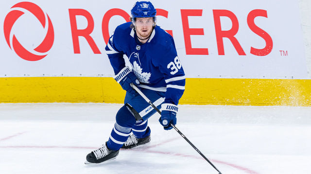 TORONTO, ON - APRIL 29: Toronto Maple Leafs Defenceman Rasmus Sandin (38) skates with the puck during the NHL regular season game between the Vancouver Canucks and the Toronto Maple Leafs on April 29, 2021, at Scotiabank Arena in Toronto, ON, Canada.