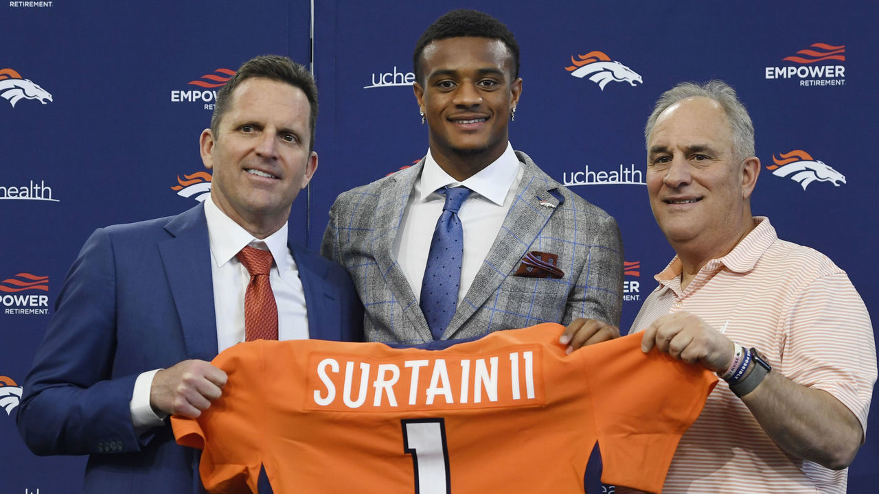 ENGLEWOOD, CO - APRIL 30: Denver Broncos first round draft pick, Patrick Surtain II, center, poses with GM George Paton, left, and head coach Vic Fangio after his introductory press conference at the UCHealth Training Center's Pat Bowlen Fieldhouse April 30, 2021. "n"n