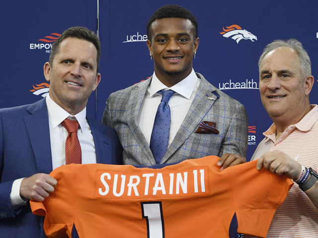 ENGLEWOOD, CO - APRIL 30: Denver Broncos first round draft pick, Patrick Surtain II, center, poses with GM George Paton, left, and head coach Vic Fangio after his introductory press conference at the UCHealth Training Center's Pat Bowlen Fieldhouse April 30, 2021. "n"n