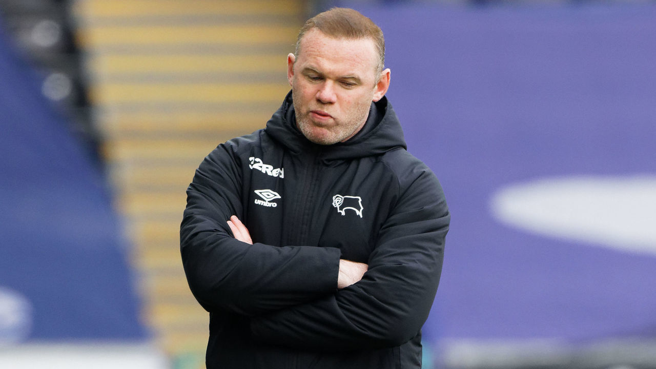 SWANSEA, WALES - MAY 01: Derby County manager Wayne Rooney walks on the touch line during the Sky Bet Championship match between Swansea City and Derby County at the Liberty Stadium on May 01, 2021 in Swansea, Wales. Sporting stadiums around the UK remain under strict restrictions due to the Coronavirus Pandemic as Government social distancing laws prohibit fans inside venues resulting in games being played behind closed doors.