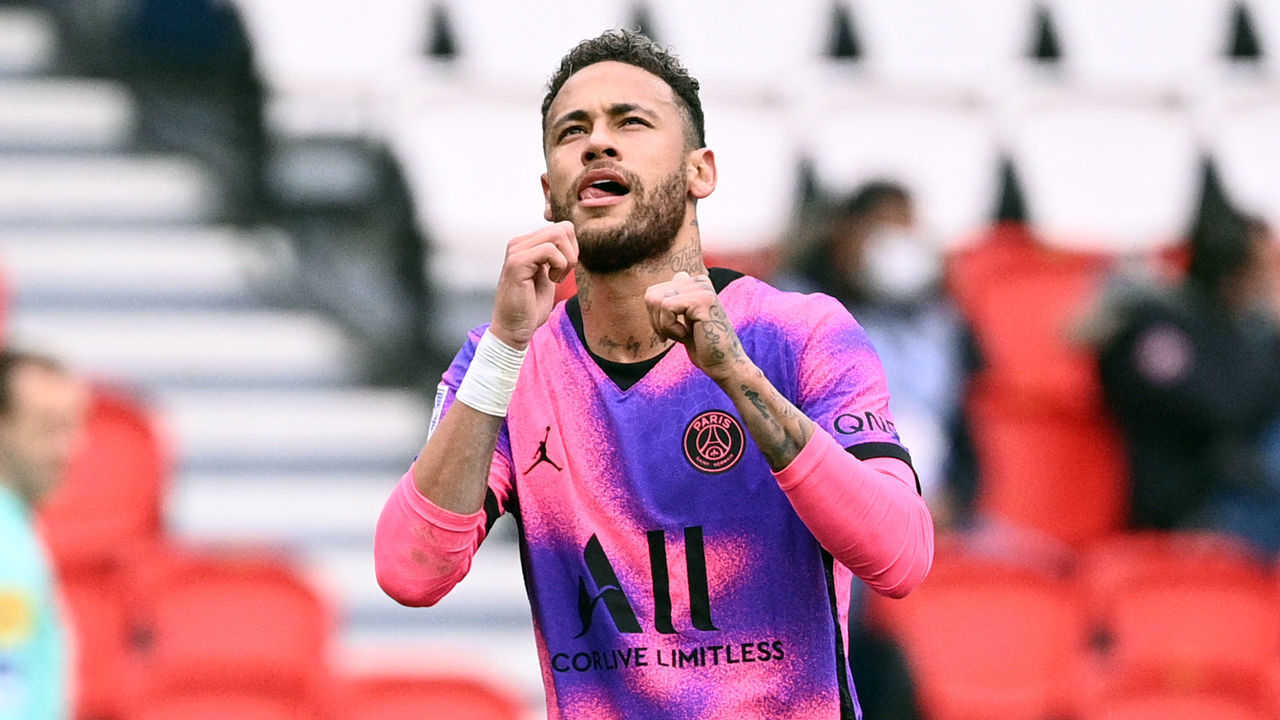 Paris Saint-Germain's Brazilian forward Neymar celebrates after scoring a goal during the French L1 football match between Paris Saint-Germain and RC Lens at the Parc des Princes stadium in Paris on May 1, 2021.