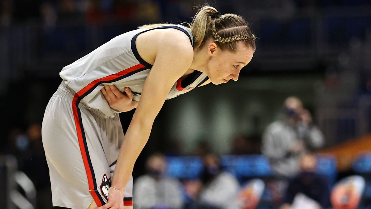 SAN ANTONIO, TEXAS - APRIL 02: Paige Bueckers #5 of the UConn Huskies reacts after an injury against the Arizona Wildcats during the third quarter in the Final Four semifinal game of the 2021 NCAA Women's Basketball Tournament at the Alamodome on April 02, 2021 in San Antonio, Texas.