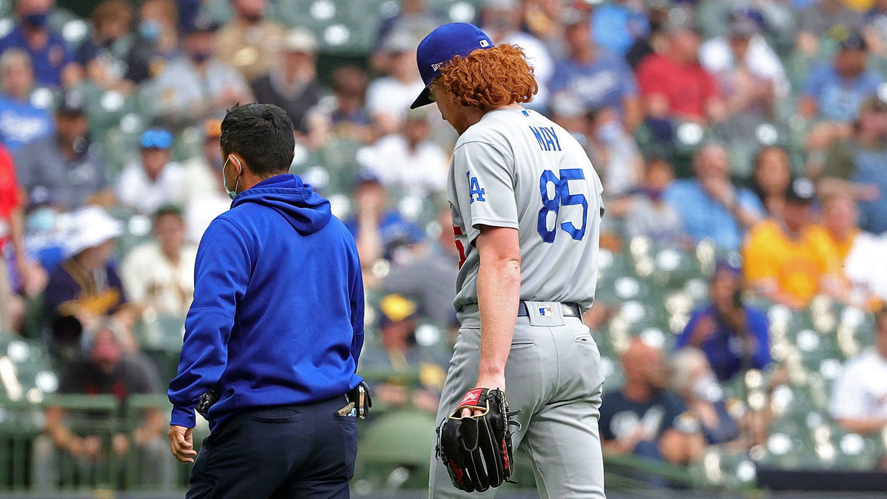 MILWAUKEE, WISCONSIN - MAY 01: Dustin May #85 of the Los Angeles Dodgers leaves the game in the second inning against the Milwaukee Brewers at American Family Field on May 01, 2021 in Milwaukee, Wisconsin.
