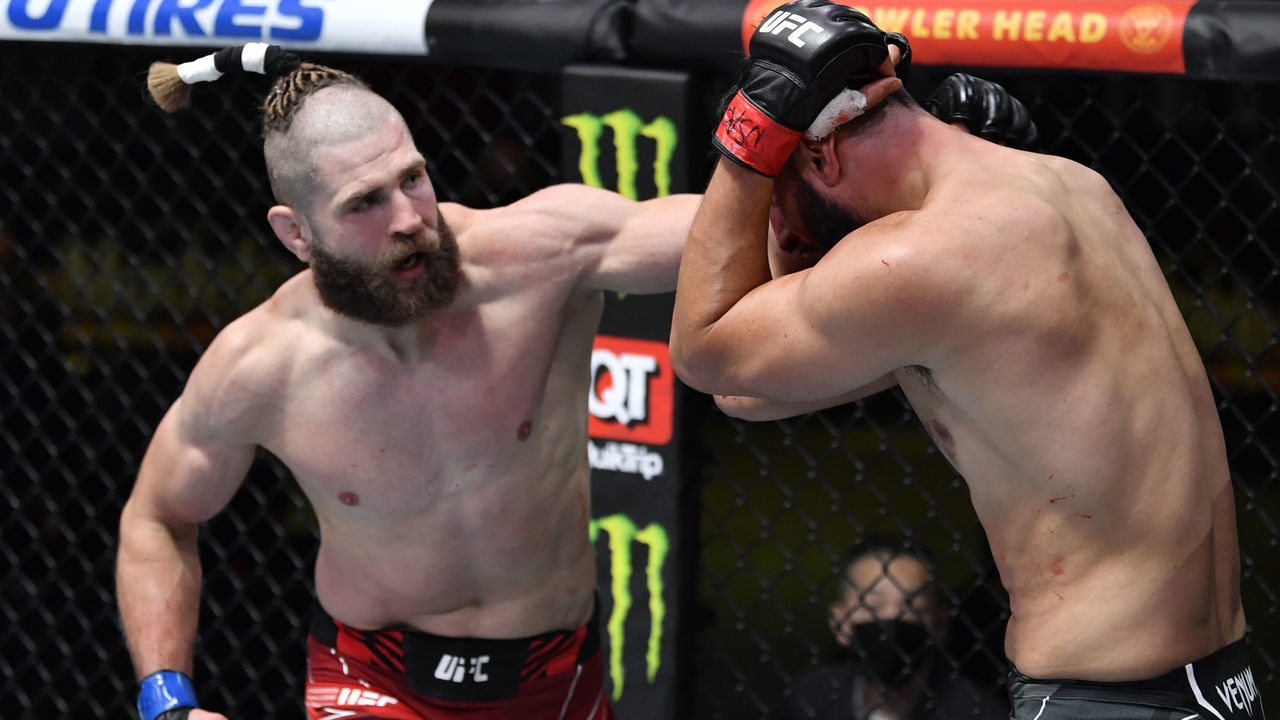LAS VEGAS, NEVADA - MAY 01: (L-R) Jiri Prochazka of the Czech Republic punches Dominick Reyes in a light heavyweight bout during the UFC Fight Night event at UFC APEX on May 01, 2021 in Las Vegas, Nevada.