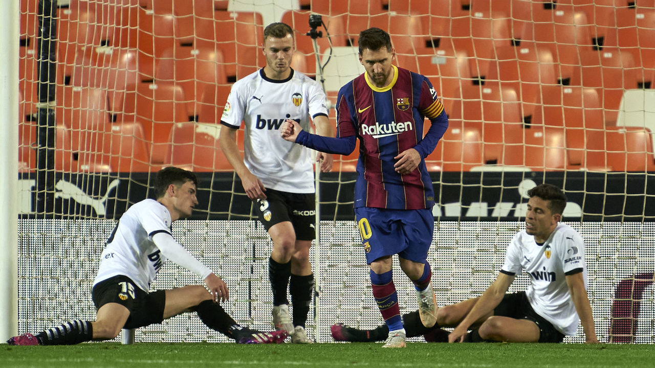 VALENCIA, SPAIN - MAY 02: Lionel Messi of FC Barcelona celebrates after scoring his team's first goal during the La Liga Santander match between Valencia CF and FC Barcelona at Estadio Mestalla on May 02, 2021 in Valencia, Spain. Sporting stadiums around Spain remain under strict restrictions due to the Coronavirus Pandemic as Government social distancing laws prohibit fans inside venues resulting in games being played behind closed doors.