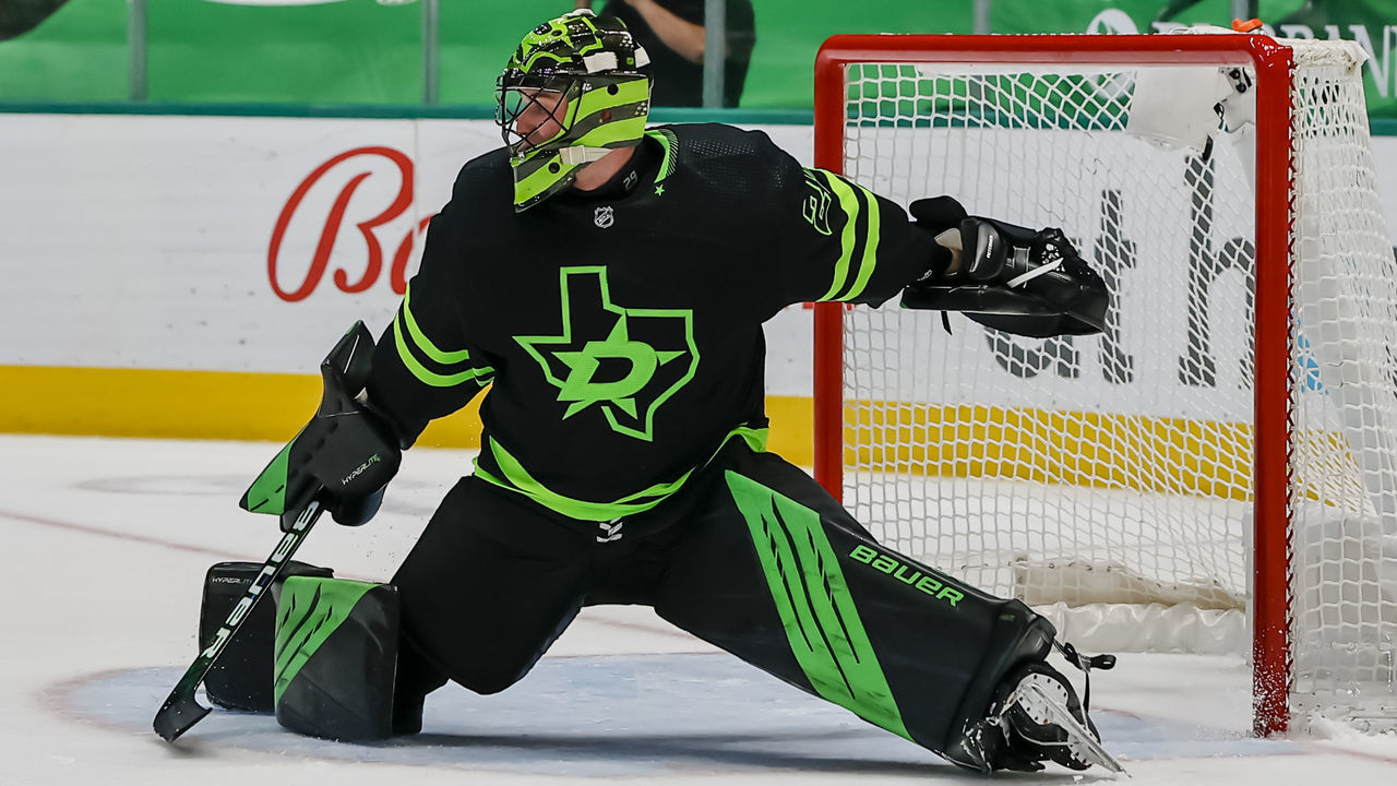 DALLAS, TX - APRIL 26: Dallas Stars goaltender Jake Oettinger (29) stretches to block a shot during the game between the Dallas Stars and the Carolina Hurricanes on April 26, 2021 at the American Airlines Center in Dallas, Texas.