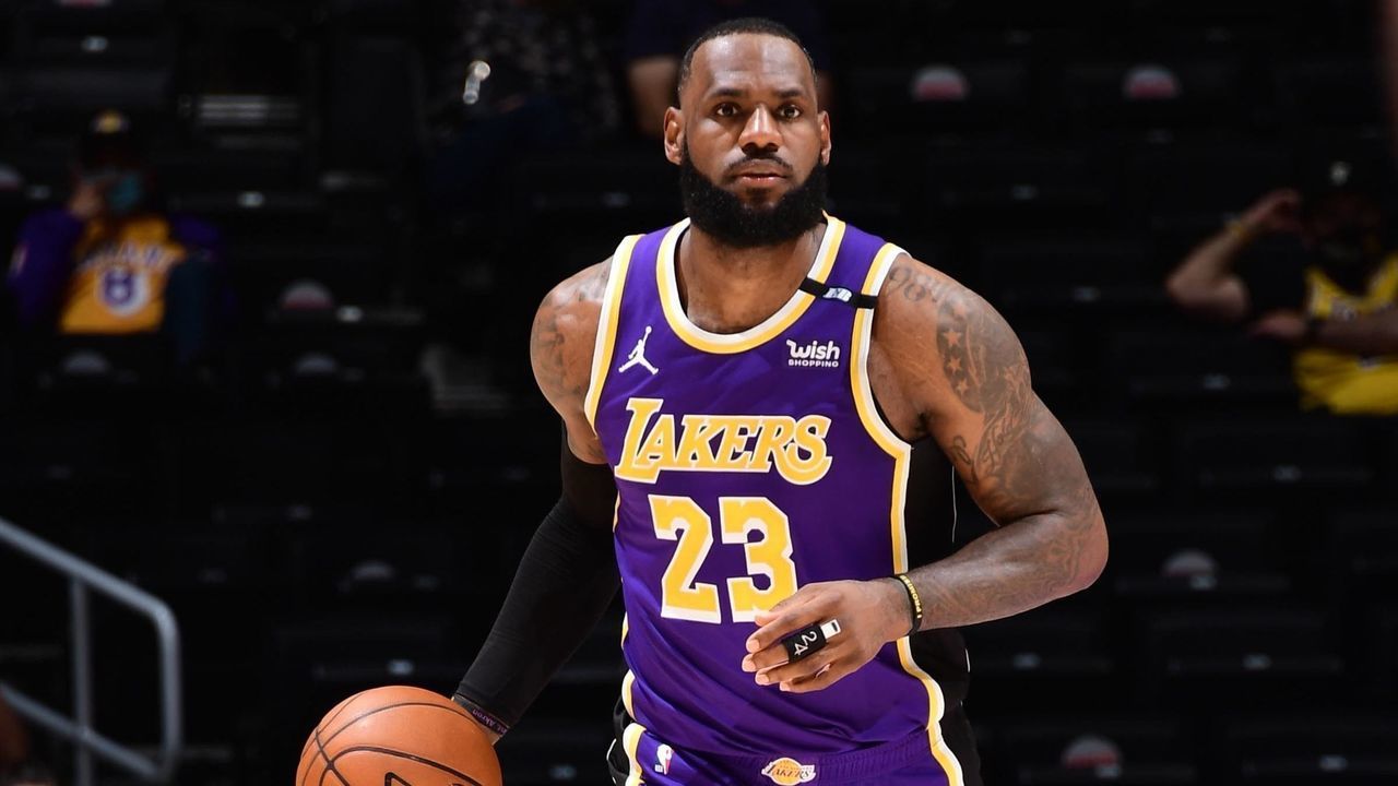 LOS ANGELES, CA - APRIL 30: LeBron James #23 of the Los Angeles Lakers dribbles the ball during the game against the Sacramento Kings on April 30, 2021 at STAPLES Center in Los Angeles, California. NOTE TO USER: User expressly acknowledges and agrees that, by downloading and/or using this Photograph, user is consenting to the terms and conditions of the Getty Images License Agreement. Mandatory Copyright Notice: Copyright 2021 NBAE
