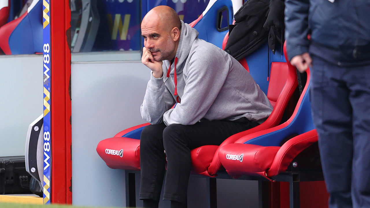 LONDON, ENGLAND - MAY 01: Pep Guardiola, Manager of Manchester City looks on from the bench during the warm up prior to the Premier League match between Crystal Palace and Manchester City at Selhurst Park on May 01, 2021 in London, England. Sporting stadiums around the UK remain under strict restrictions due to the Coronavirus Pandemic as Government social distancing laws prohibit fans inside venues resulting in games being played behind closed doors.