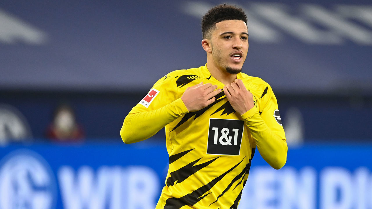 Dortmund's English midfielder Jadon Sancho celebrates scoring the opening goal during the German first division Bundesliga football match FC Schalke 04 vs Borussia Dortmund in Gelsenkirchen, western Germany, on February 20, 2021.
