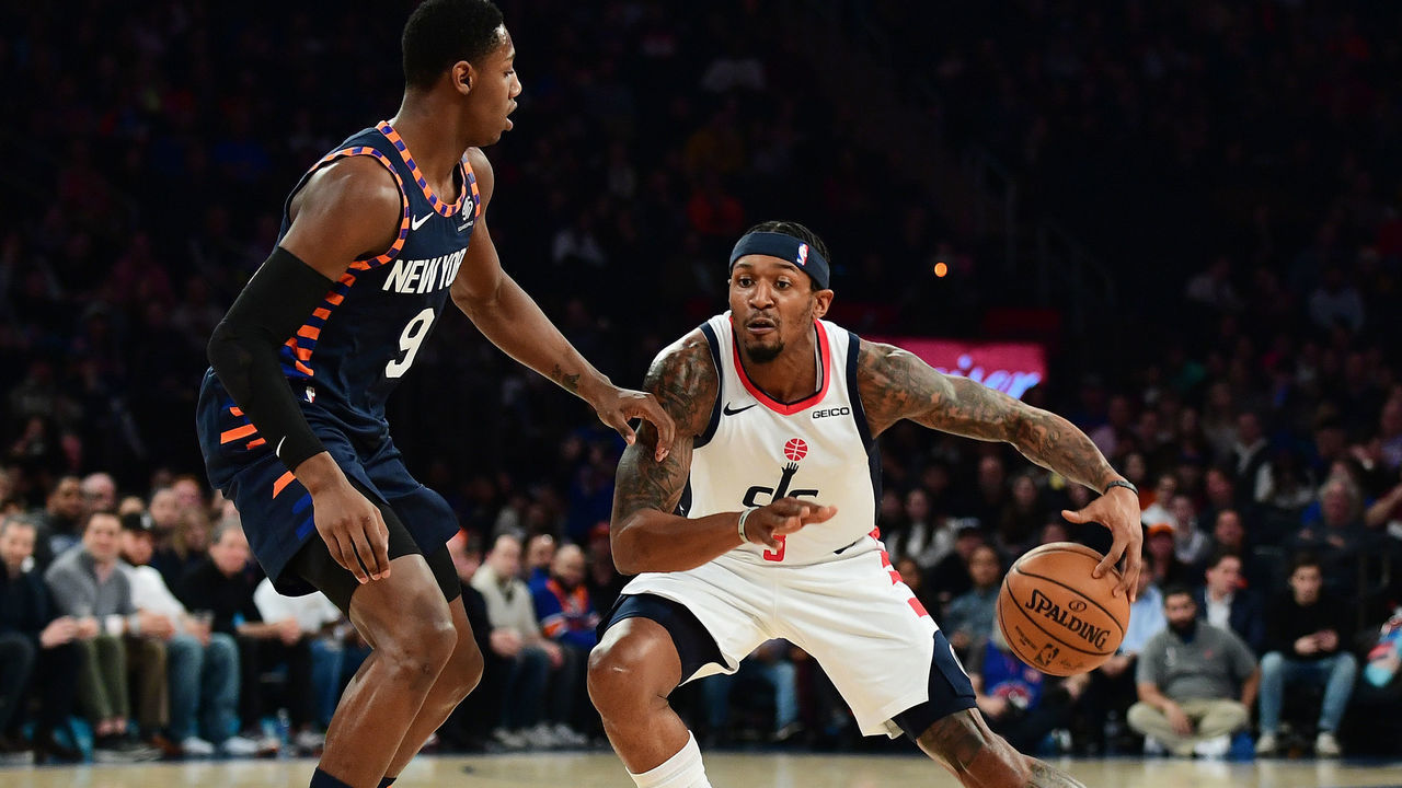 NEW YORK, NEW YORK - DECEMBER 23: Bradley Beal #3 of the Washington Wizards looks to drive past RJ Barrett #9 of the New York Knicks during the first half of their game at Madison Square Garden on December 23, 2019 in New York City.