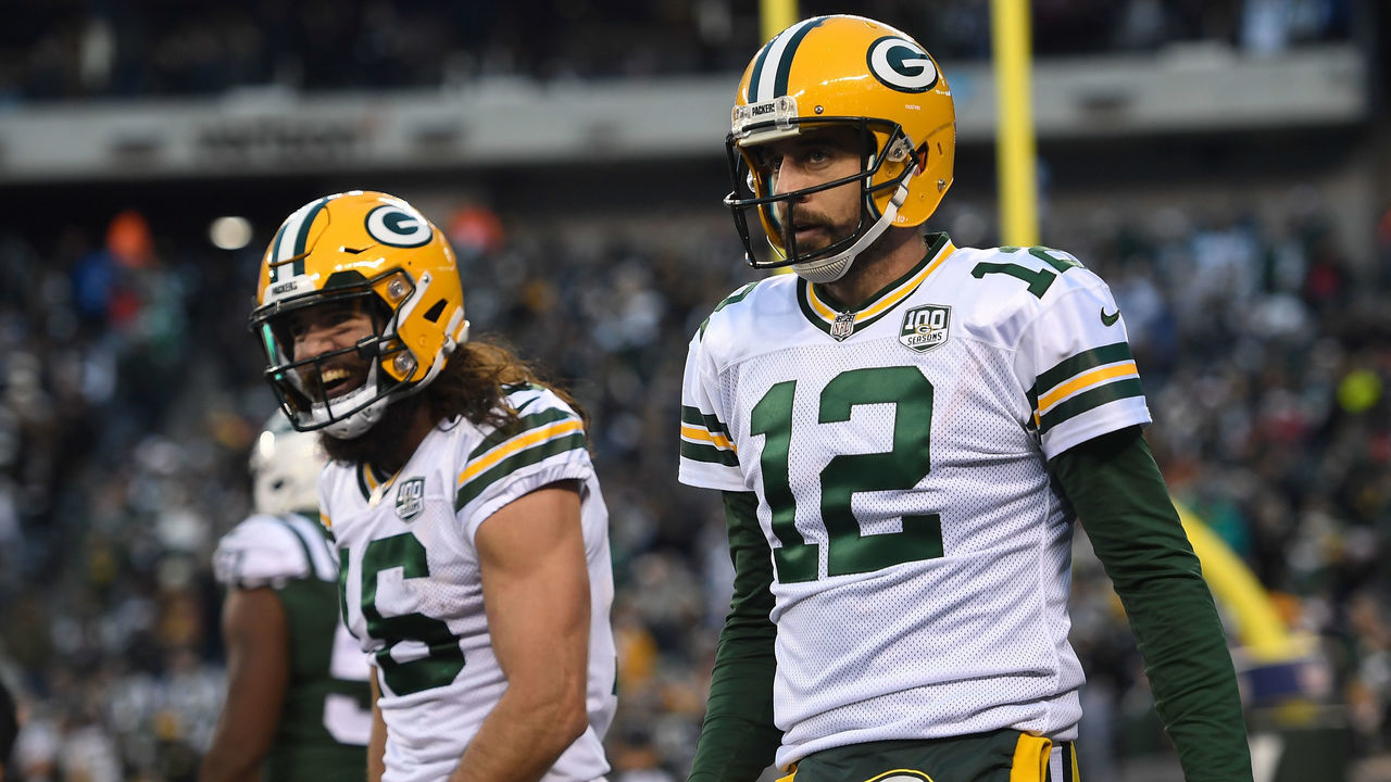 EAST RUTHERFORD, NJ - DECEMBER 23: Aaron Rodgers #12 of the Green Bay Packers celebrates with Jake Kumerow #16 after scoring a touchdown against the New York Jets in the fourth quarter during the at MetLife Stadium on December 23, 2018 in East Rutherford, New Jersey.