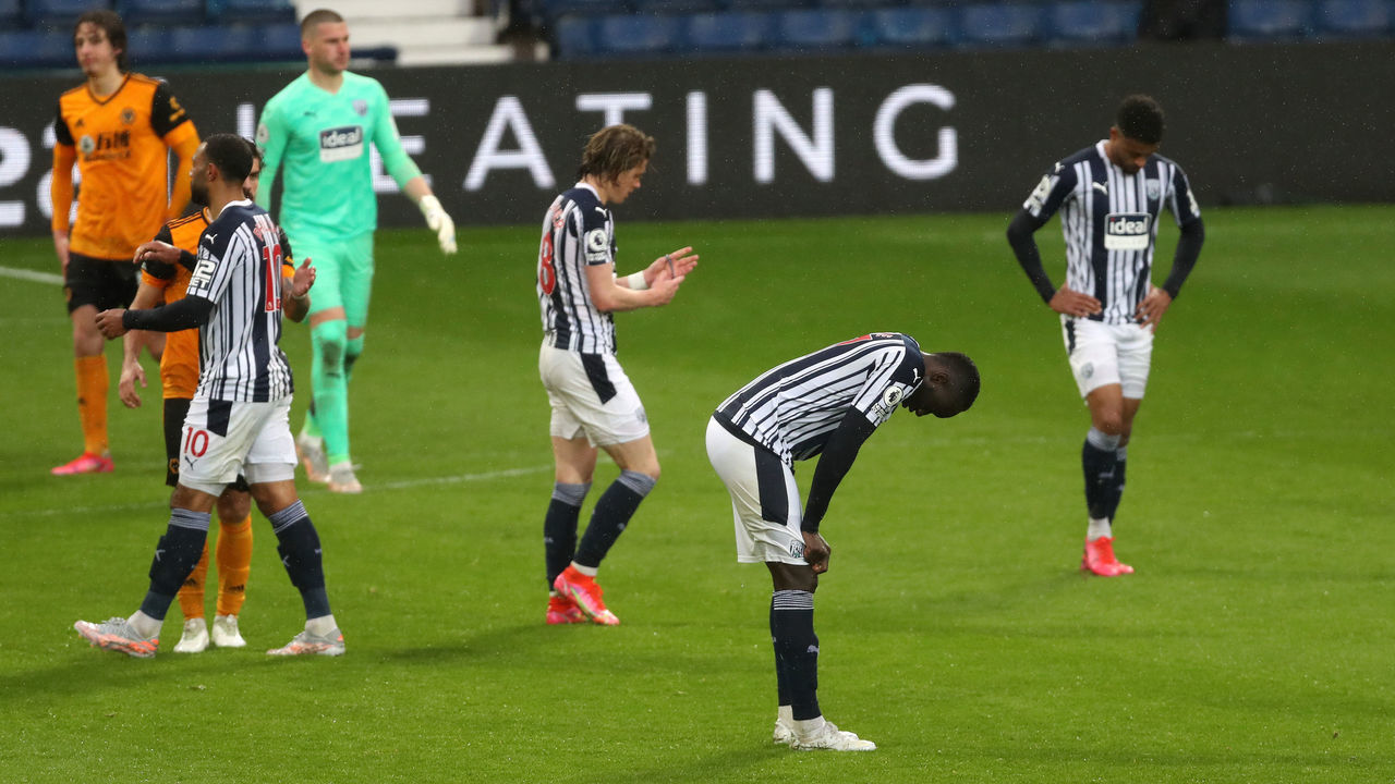 WEST BROMWICH, ENGLAND - MAY 03: A dejected Mbaye Diagne of West Bromwich Albion reacts to the 1-1 scoreline at the final whistle during the Premier League match between West Bromwich Albion and Wolverhampton Wanderers at The Hawthorns on May 3, 2021 in West Bromwich, United Kingdom. Sporting stadiums around the UK remain under strict restrictions due to the Coronavirus Pandemic as Government social distancing laws prohibit fans inside venues resulting in games being played behind closed doors.