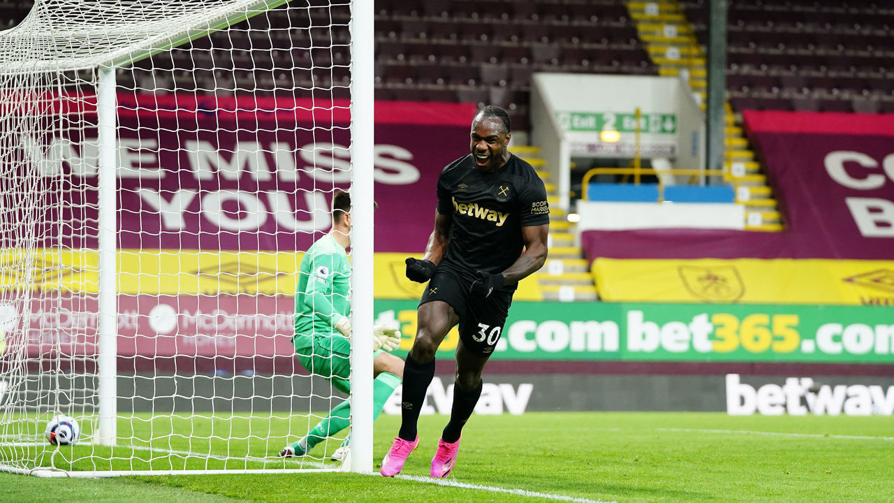 BURNLEY, ENGLAND - MAY 03: Michail Antonio of West Ham United celebrates after scoring their side's second goal during the Premier League match between Burnley and West Ham United at Turf Moor on May 03, 2021 in Burnley, England. Sporting stadiums around the UK remain under strict restrictions due to the Coronavirus Pandemic as Government social distancing laws prohibit fans inside venues resulting in games being played behind closed doors.