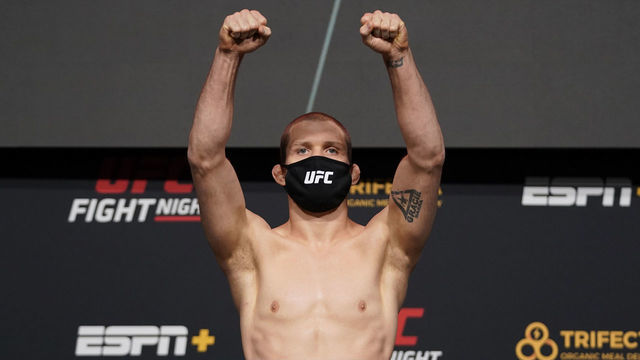 LAS VEGAS, NEVADA - DECEMBER 18: Alex Morono poses on the scale during the UFC Fight Night weigh-in at UFC APEX on December 18, 2020 in Las Vegas, Nevada.