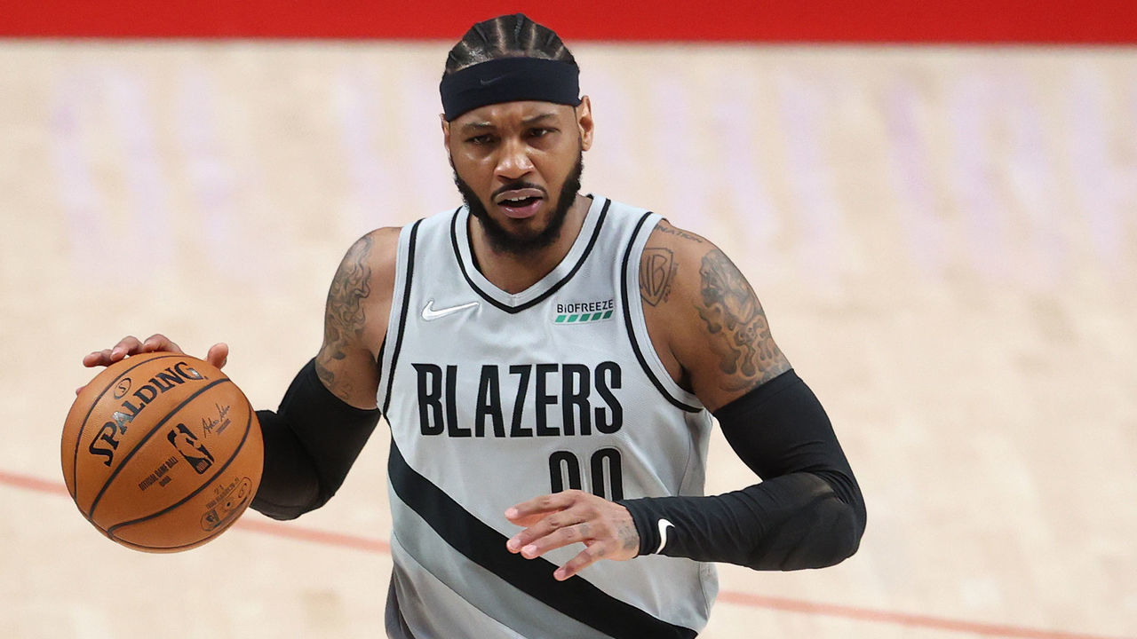 PORTLAND, OREGON - APRIL 13: Carmelo Anthony #00 of the Portland Trail Blazers dribbles down the court in the second quarter against the Boston Celtics at Moda Center on April 13, 2021 in Portland, Oregon.