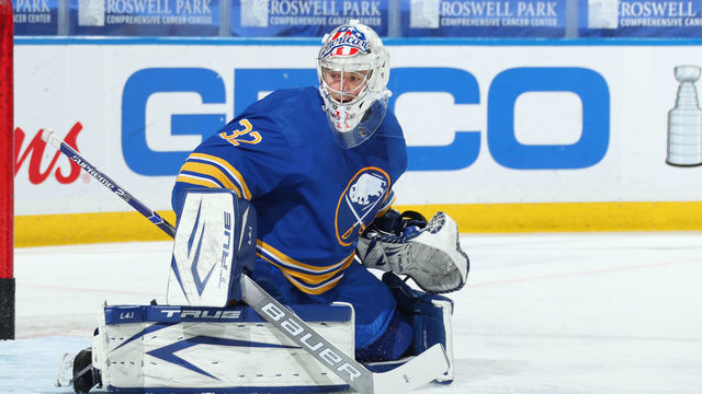 BUFFALO, NY - MAY 3: Michael Houser #32 of the Buffalo Sabres tends goal during warmups before playing in his 1st NHL game against the New York Islanders on May 3, 2021 at KeyBank Center in Buffalo, New York.