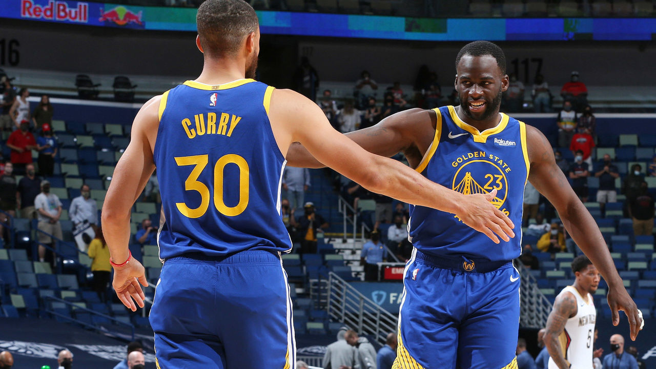 NEW ORLEANS, LA - MAY 3: Stephen Curry #30 of the Golden State Warriors high fives Draymond Green #23 of the Golden State Warriors before the game against the New Orleans Pelicans on May 3, 2021 at the Smoothie King Center in New Orleans, Louisiana. Mandatory Copyright Notice: Copyright 2021 NBAE