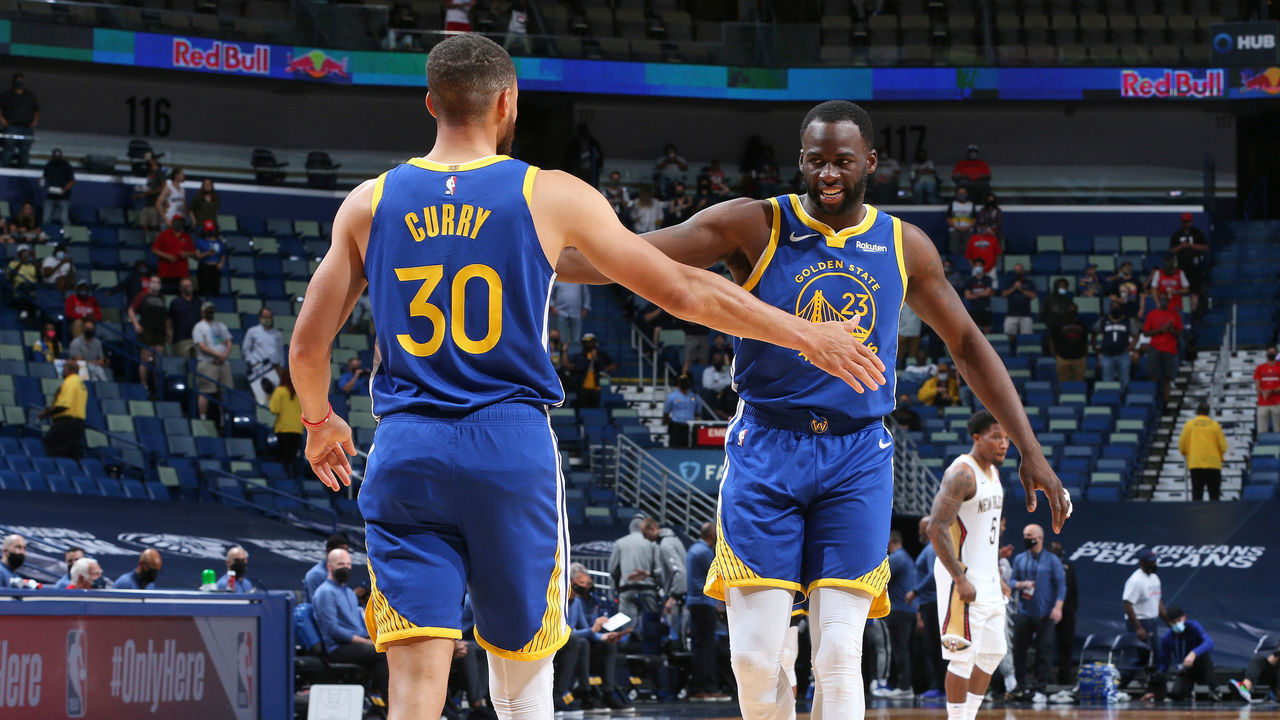 NEW ORLEANS, LA - MAY 3: Stephen Curry #30 of the Golden State Warriors high fives Draymond Green #23 of the Golden State Warriors before the game against the New Orleans Pelicans on May 3, 2021 at the Smoothie King Center in New Orleans, Louisiana. Mandatory Copyright Notice: Copyright 2021 NBAE