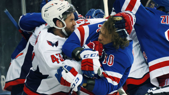 NEW YORK, NEW YORK - MAY 03: Tom Wilson #43 of the Washington Capitals takes a roughing penalty during the second period against Artemi Panarin #10 of the New York Rangers at Madison Square Garden on May 03, 2021 in New York City.