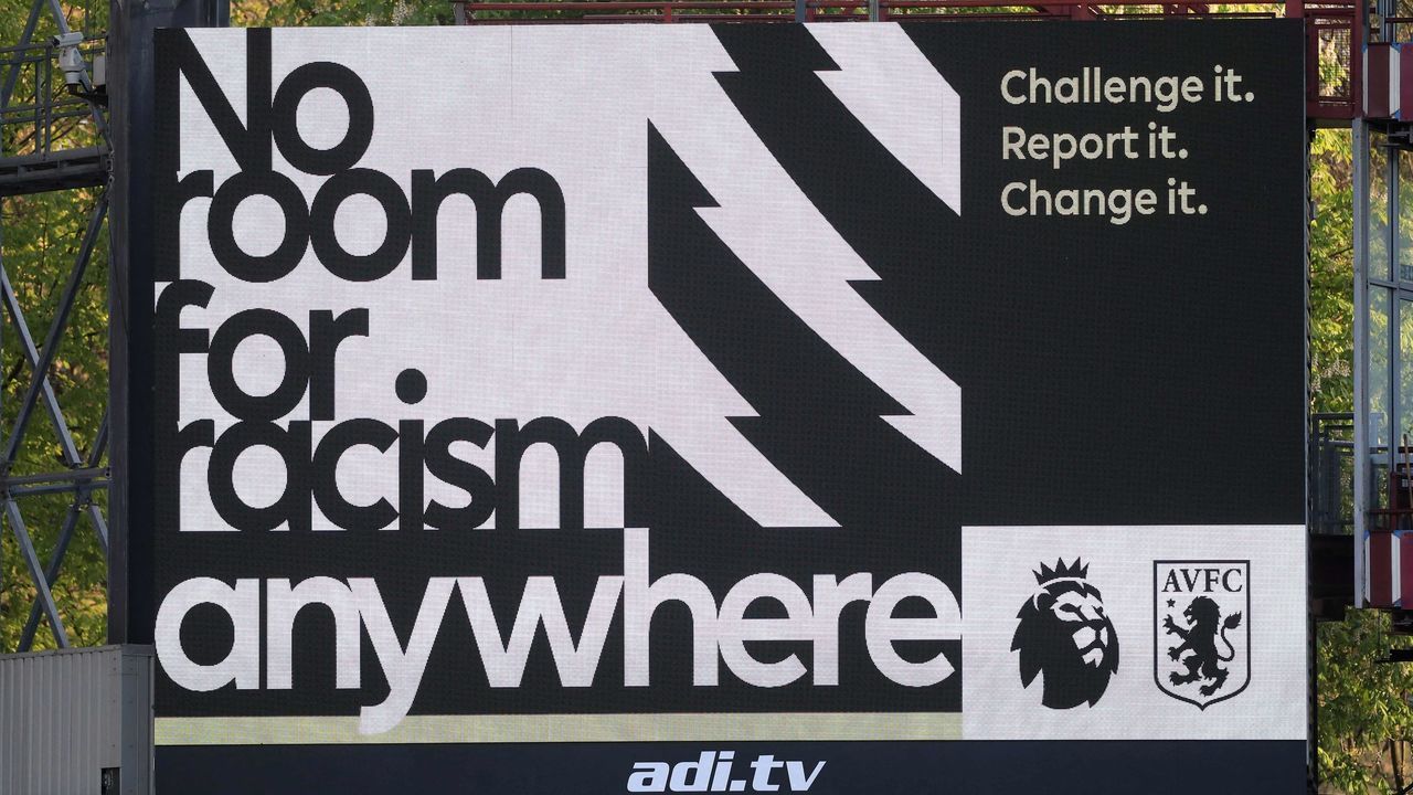 The No Room For Racism campaign messgae is displayed on a screen ahead of the English Premier League football match between Aston Villa and West Bromwich Albion at Villa Park in Birmingham, central England on April 25, 2021. - RESTRICTED TO EDITORIAL USE. No use with unauthorized audio, video, data, fixture lists, club/league logos or 'live' services. Online in-match use limited to 120 images. An additional 40 images may be used in extra time. No video emulation. Social media in-match use limited to 120 images. An additional 40 images may be used in extra time. No use in betting publications, games or single club/league/player publications.