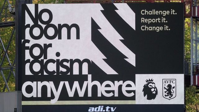 The No Room For Racism campaign messgae is displayed on a screen ahead of the English Premier League football match between Aston Villa and West Bromwich Albion at Villa Park in Birmingham, central England on April 25, 2021. - RESTRICTED TO EDITORIAL USE. No use with unauthorized audio, video, data, fixture lists, club/league logos or 'live' services. Online in-match use limited to 120 images. An additional 40 images may be used in extra time. No video emulation. Social media in-match use limited to 120 images. An additional 40 images may be used in extra time. No use in betting publications, games or single club/league/player publications.