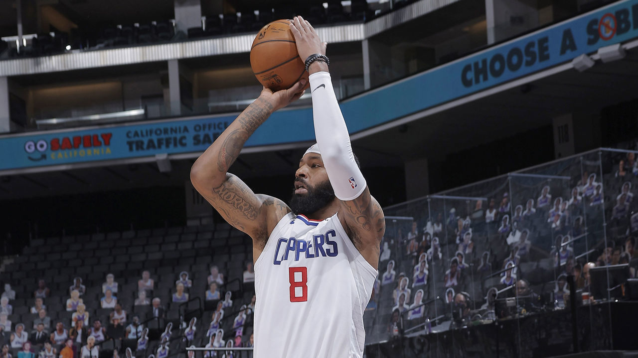 SACRAMENTO, CA - JANUARY 15: Marcus Morris Sr. #8 of the Los Angeles Clippers shoots a three pointer against the Sacramento Kings on January 15, 2021 at Golden 1 Center in Sacramento, California. NOTE TO USER: User expressly acknowledges and agrees that, by downloading and or using this photograph, User is consenting to the terms and conditions of the Getty Images Agreement. Mandatory Copyright Notice: Copyright 2021 NBAE