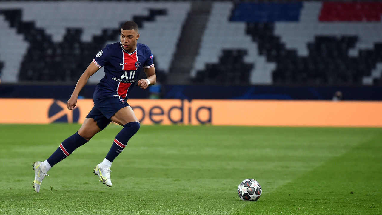 PARIS, FRANCE - APRIL 28: Kylian Mbappe of Paris Saint-Germain runs with the ball during the UEFA Champions League Semi Final First Leg match between Paris Saint-Germain and Manchester City at Parc des Princes on April 28, 2021 in Paris, France.