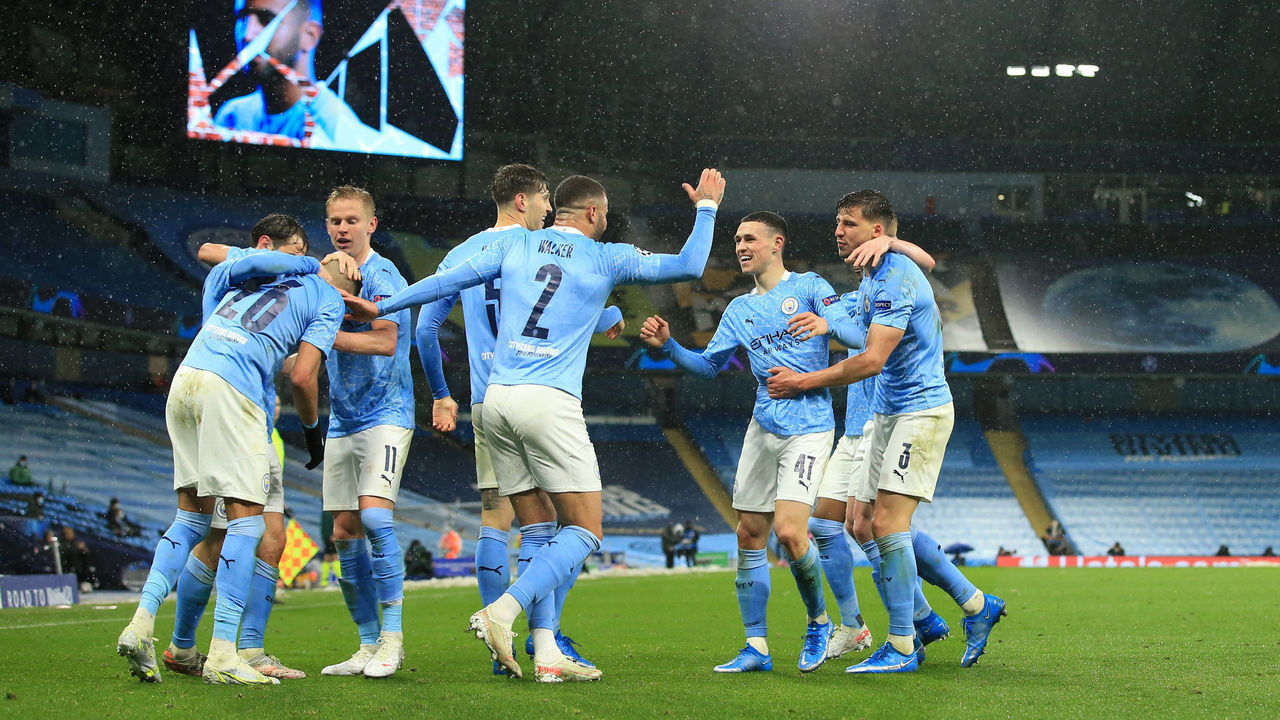 MANCHESTER, ENGLAND - MAY 04: Riyad Mahrez of Manchester City celebrates scoring their 2nd goal with his team during the UEFA Champions League Semi Final Second Leg match between Manchester City and Paris Saint-Germain at Etihad Stadium on May 4, 2021 in Manchester, United Kingdom. Sporting stadiums around the UK remain under strict restrictions due to the Coronavirus Pandemic as Government social distancing laws prohibit fans inside venues resulting in games being played behind closed doors.