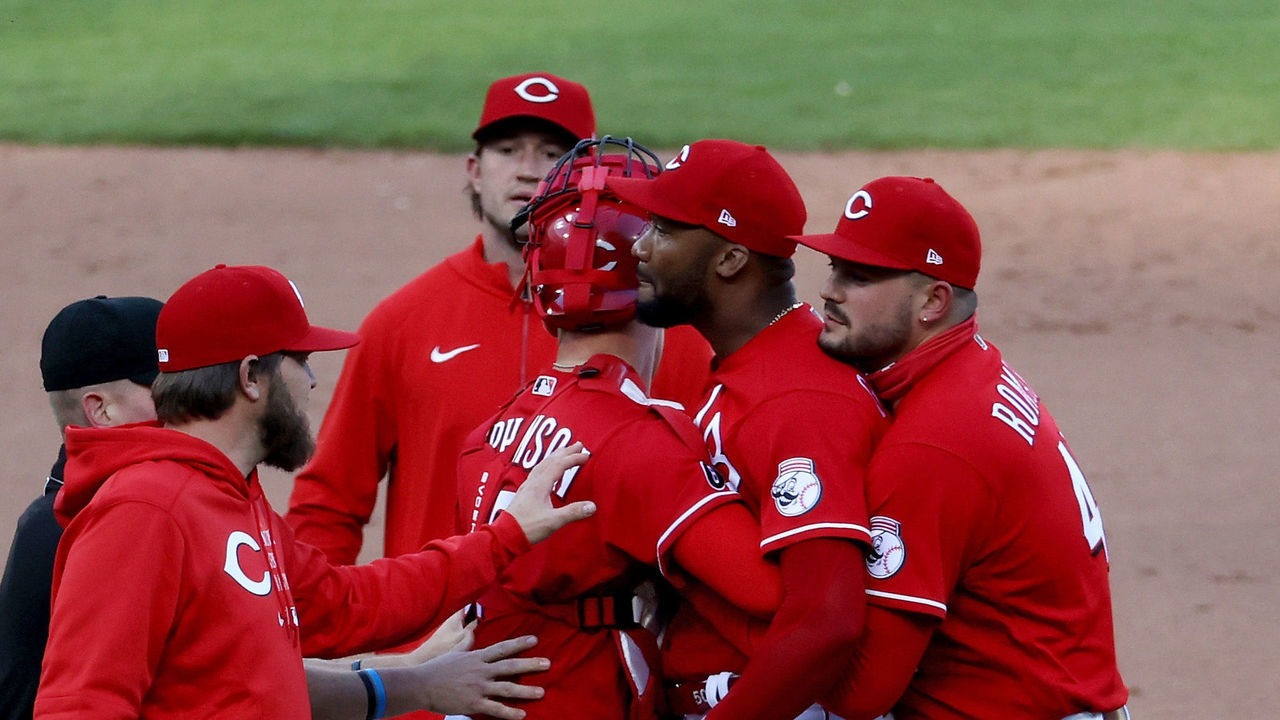 CINCINNATI, OHIO - MAY 01: Amir Garrett #50 of the Cincinnati Reds is restrained by teammates during a bench clearing incident in the eighth inning against the Chicago Cubs at Great American Ball Park on May 01, 2021 in Cincinnati, Ohio.