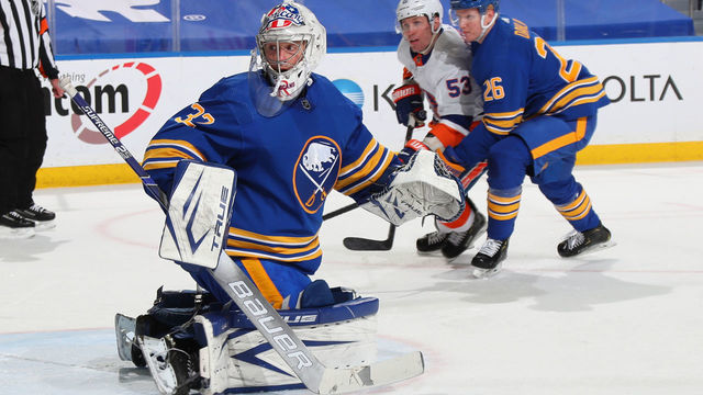 BUFFALO, NY - MAY 4: Michael Houser #32 of the Buffalo Sabres makes a second period save against the New York Islanders during an NHL game on May 4, 2021 at KeyBank Center in Buffalo, New York.