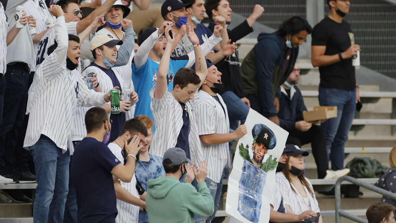 NEW YORK, NEW YORK - MAY 04: New York Yankees fans cheer during the first inning against the Houston Astros at Yankee Stadium on May 04, 2021 in the Bronx borough of New York City.
