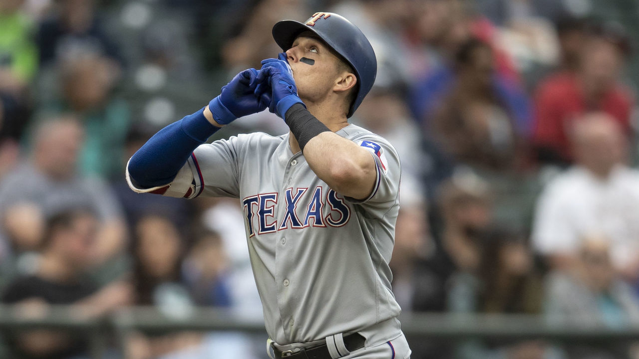 SEATTLE, WA - SEPTEMBER 30: Drew Robinson #18 of the Texas Rangers celebrates hitting a solo home run off of relief pitcher James Pazos #47 of the Seattle Mariners during the sixth inning of a game at Safeco Field on September 30, 2018 in Seattle, Washington.