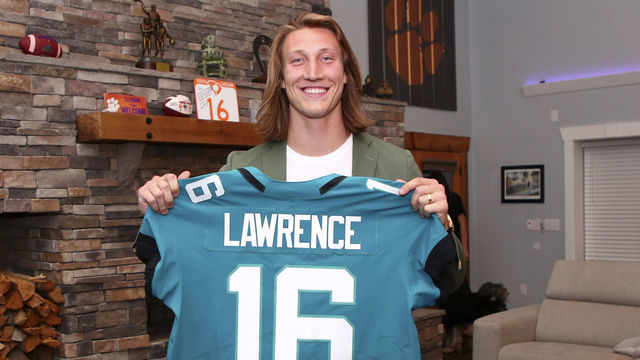 SENECA, SOUTH CAROLINA - APRIL 29: In this handout photo provided by the National Football League, quarterback Trevor Lawrence poses after being selected with the first overall pick by the Jacksonville Jaguars in the 2021 NFL Draft on April 29, 2021 in Seneca, South Carolina.