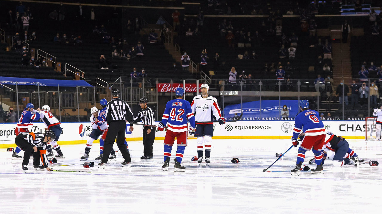 NEW YORK, NEW YORK - MAY 05: The game between the Washington Capitals and the New York Rangers starts with a line brawl one second into play at Madison Square Garden on May 05, 2021 in New York City.
