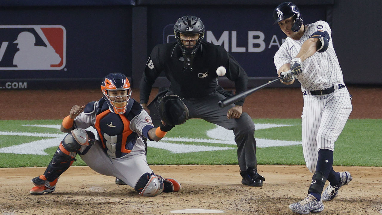 NEW YORK, NEW YORK - MAY 04: Giancarlo Stanton #27 of the New York Yankees doubles during the fifth inning against the Houston Astros at Yankee Stadium on May 04, 2021 in the Bronx borough of New York City. The Yankees won 7-3.