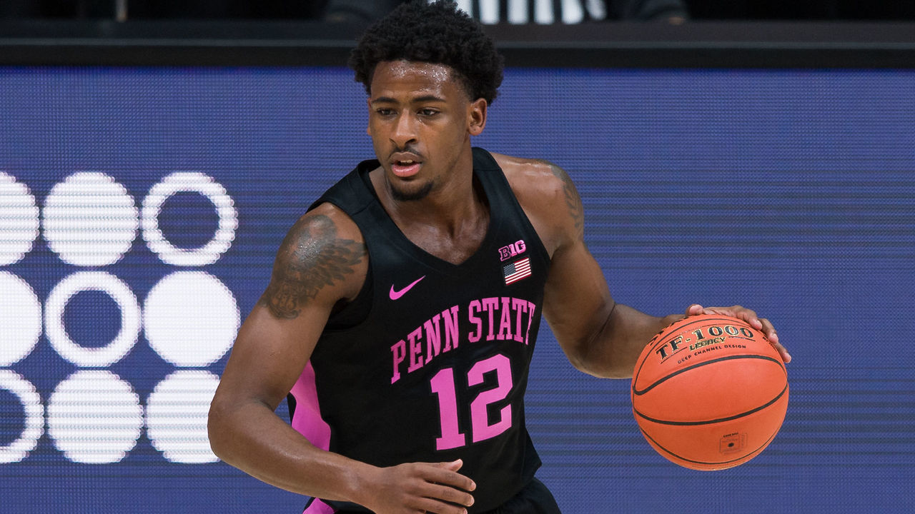INDIANAPOLIS, IN - MARCH 11: Penn State Nittany Lions guard Izaiah Brockington (12) sets up the offense during the men's Big Ten tournament college basketball game between the Penn State Nittany Lions and Wisconsin Badgers on March 11, 2021, at Lucas Oil Stadium in Indianapolis, IN.
