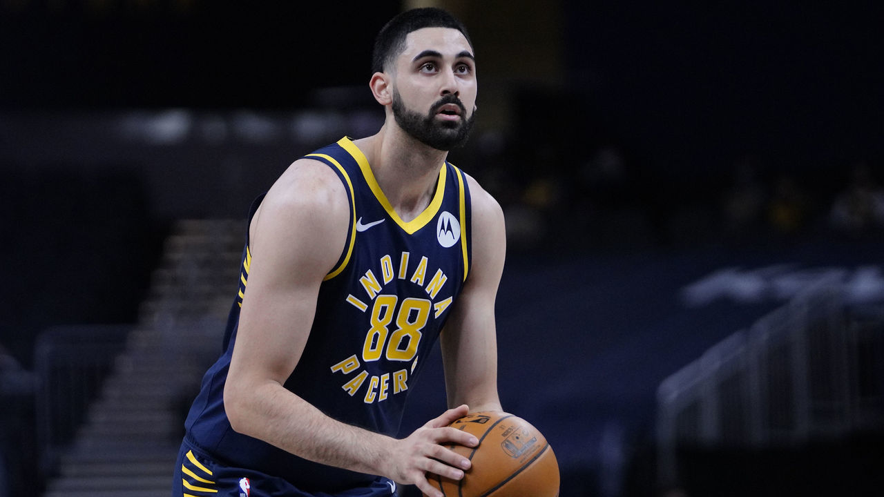 INDIANAPOLIS, IN - JANUARY 25: Goga Bitadze #88 of the Indiana Pacers shoots a free throw during the game against the Toronto Raptors on January 25, 2021 at Bankers Life Fieldhouse in Indianapolis, Indiana. Mandatory Copyright Notice: Copyright 2021 NBAE