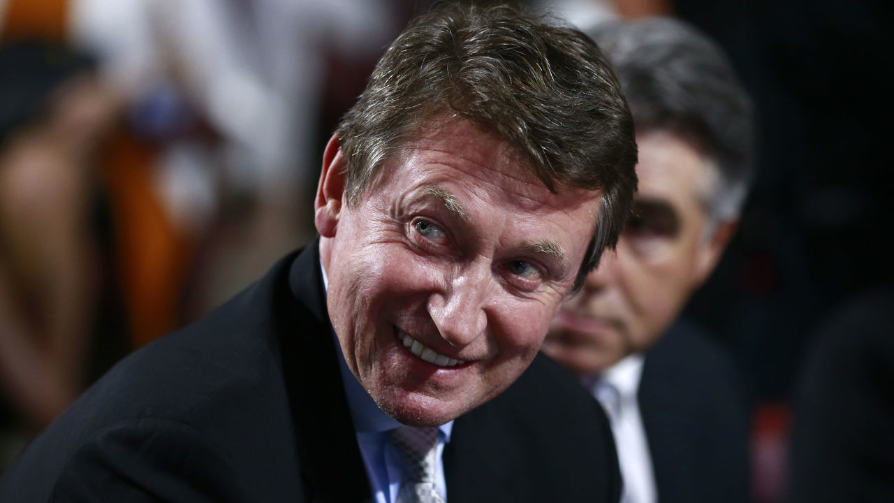 VANCOUVER, BRITISH COLUMBIA - JUNE 21: Former NHL player Wayne Gretzky of the Edmonton Oilers looks on from the draft table during the first round of the 2019 NHL Draft at Rogers Arena on June 21, 2019 in Vancouver, Canada.