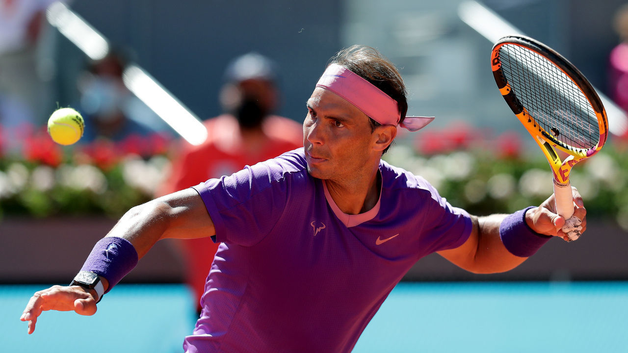 MADRID, SPAIN - MAY 06: Rafael Nadal of Spain hits the ball after victory during his third round match against Alexei Popyrin of Australia during day eight of the Mutua Madrid Open at La Caja Magica on May 06, 2021 in Madrid, Spain.