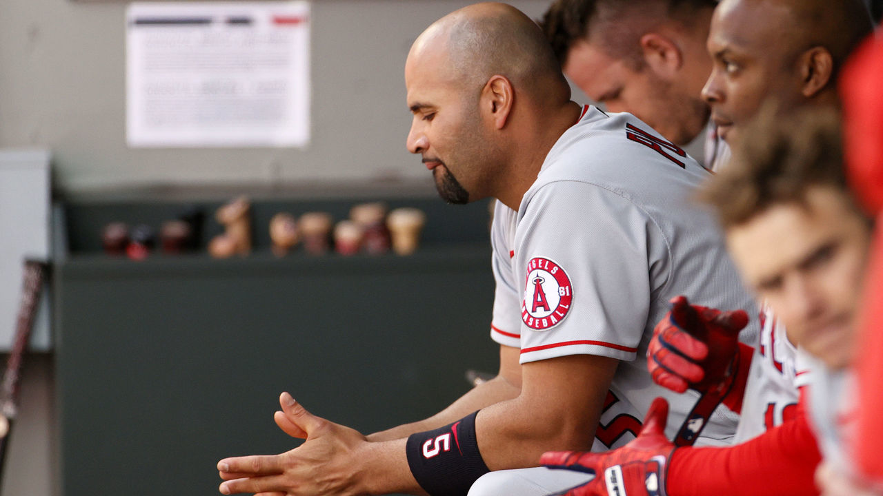 SEATTLE, WASHINGTON - MAY 02: Albert Pujols #5 of the Los Angeles Angels sits in the dugout during the game against the Seattle Mariners at T-Mobile Park on May 02, 2021 in Seattle, Washington.
