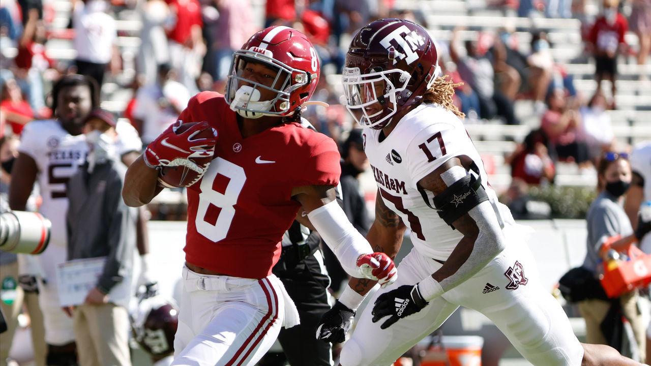 TUSCALOOSA, AL - OCTOBER 3: John Metchie III #8 of the Alabama Crimson Tide makes a catch ahead of Jaylon Jones #17 of the Texas A&M Aggies on October 3, 2020 at Bryant-Denny Stadium in Tuscaloosa, Alabama.
