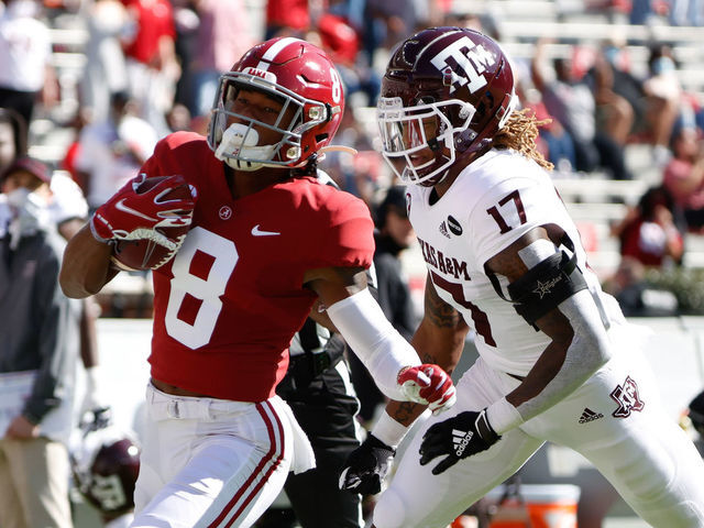 TUSCALOOSA, AL - OCTOBER 3: John Metchie III #8 of the Alabama Crimson Tide makes a catch ahead of Jaylon Jones #17 of the Texas A&M Aggies on October 3, 2020 at Bryant-Denny Stadium in Tuscaloosa, Alabama.