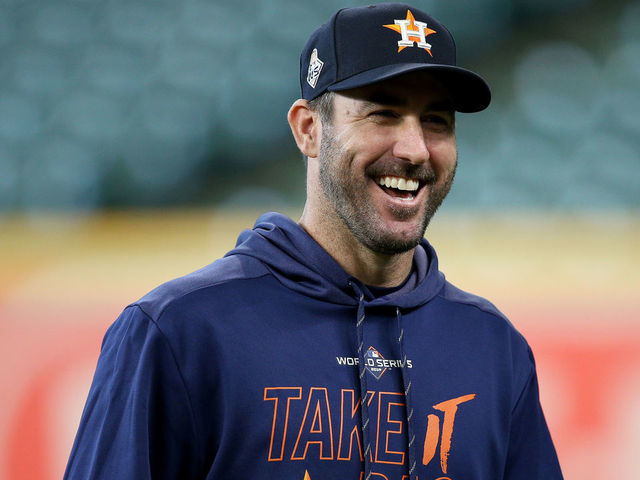 HOUSTON, TEXAS - OCTOBER 22: Justin Verlander #35 of the Houston Astros laughs during batting practice prior to Game One of the 2019 World Series against the Washington Nationals at Minute Maid Park on October 22, 2019 in Houston, Texas.